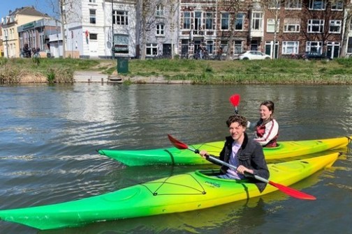 a person rowing a boat in the water